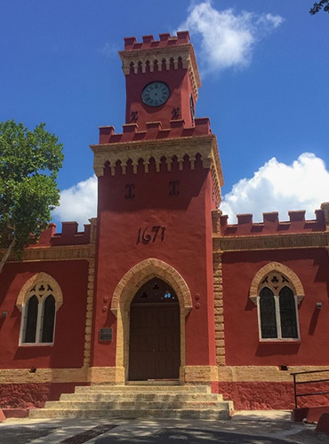 Red clock tower building